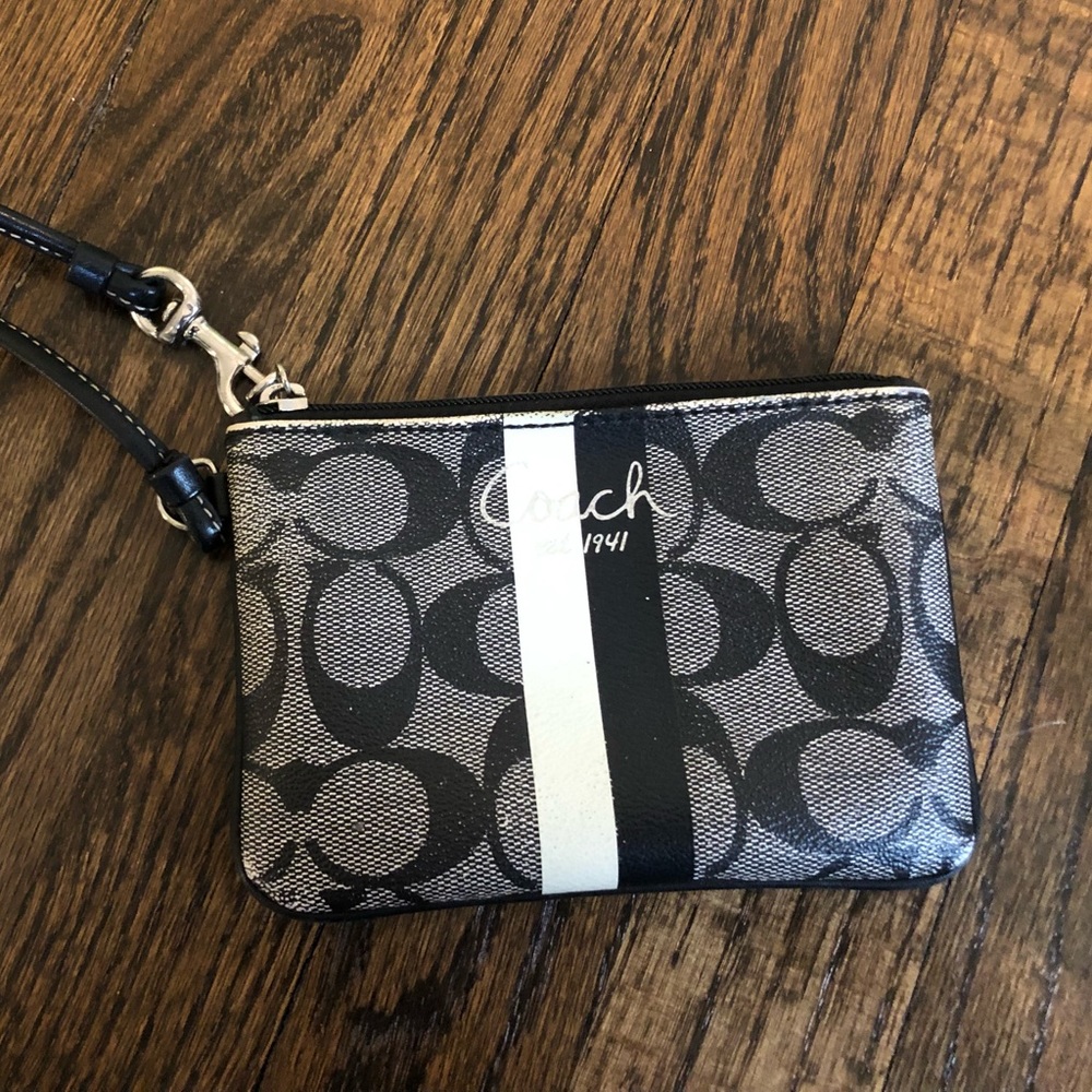 Black white and gray Coach wristlet